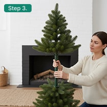 landscaping with water feature - modern backyard tiered fountain with LED lights at night